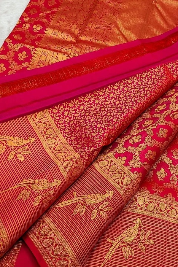 Geometric Zari Jaal Banarasi Soft Silk Saree with Bird Motif Border in Maroon and Red  in Surat