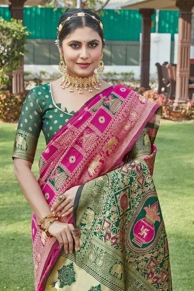 Gharchola-Style Zari Checks Banarasi Soft Silk Saree with Green Contrast Pallu in Pink and Wine in Surat
