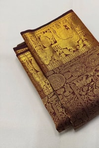 Gold Tissue Look Banarasi Soft Silk Saree with Heavy Zari Weave and Maroon Accents  in Surat