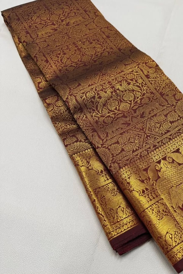 Gold Tissue Look Banarasi Soft Silk Saree with Heavy Zari Weave and Maroon Accents  in Surat