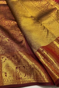 Gold Tissue Look Banarasi Soft Silk Saree with Heavy Zari Weave and Maroon Accents  in Surat