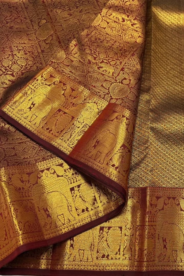 Gold Tissue Look Banarasi Soft Silk Saree with Heavy Zari Weave and Maroon Accents  in Surat