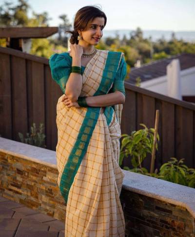 Golden Elegance A Rich Pallu Saree with Allover Box Design and Intricate Zari Weaving in Surat