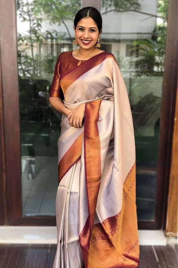Golden Elegance Banarasi Soft Silk Saree with Intricate Design descripson  in Surat