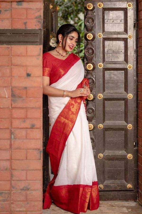 Golden Heavy Border Rich Pallu Peacock Design Saree  in Surat