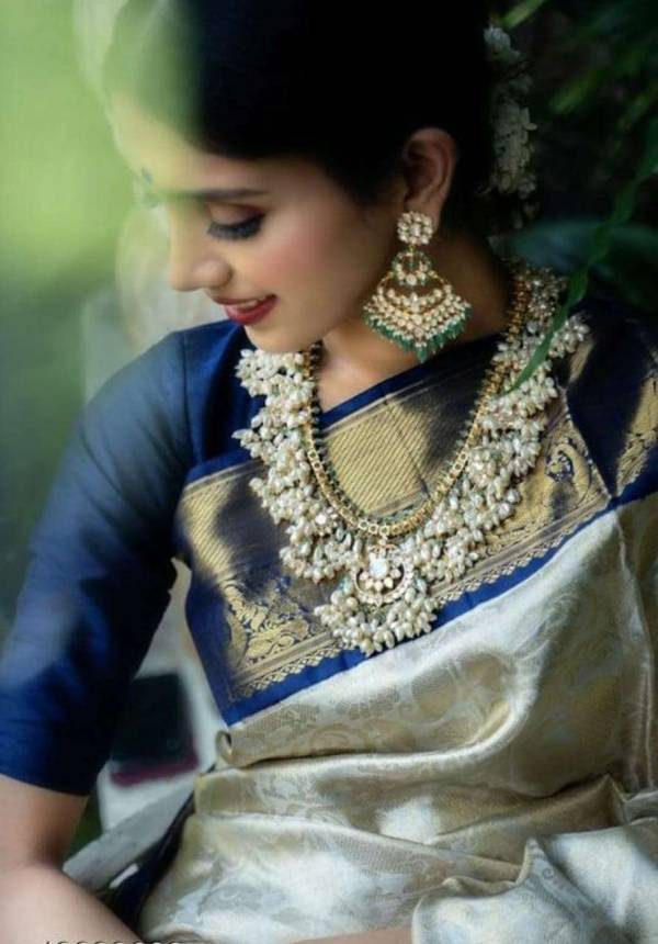 Golden Rich Pallu with Allover Flower Design Saree  in Surat