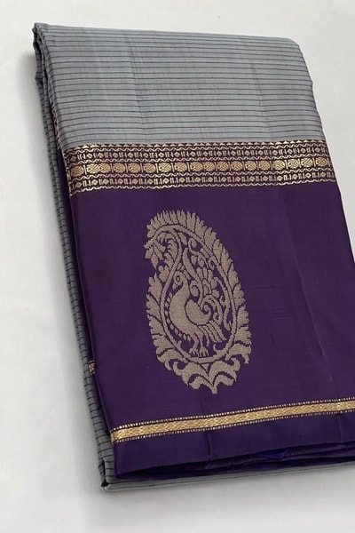 Grey Banarasi Soft Silk Saree with Deep Purple Border and Peacock Paisley Zari Motifs in Surat