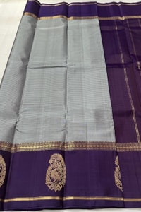 Grey Banarasi Soft Silk Saree with Deep Purple Border and Peacock Paisley Zari Motifs  in Surat