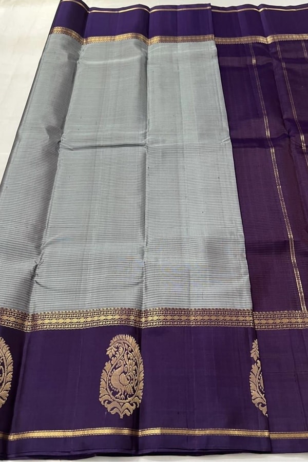 Grey Banarasi Soft Silk Saree with Deep Purple Border and Peacock Paisley Zari Motifs  in Surat