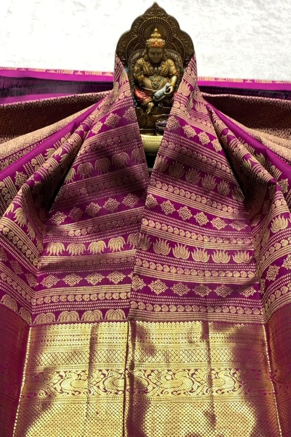Horizontal Zari Band Banarasi Soft Silk Saree with Lotus and Mango Motifs in Red and Wine  in Surat