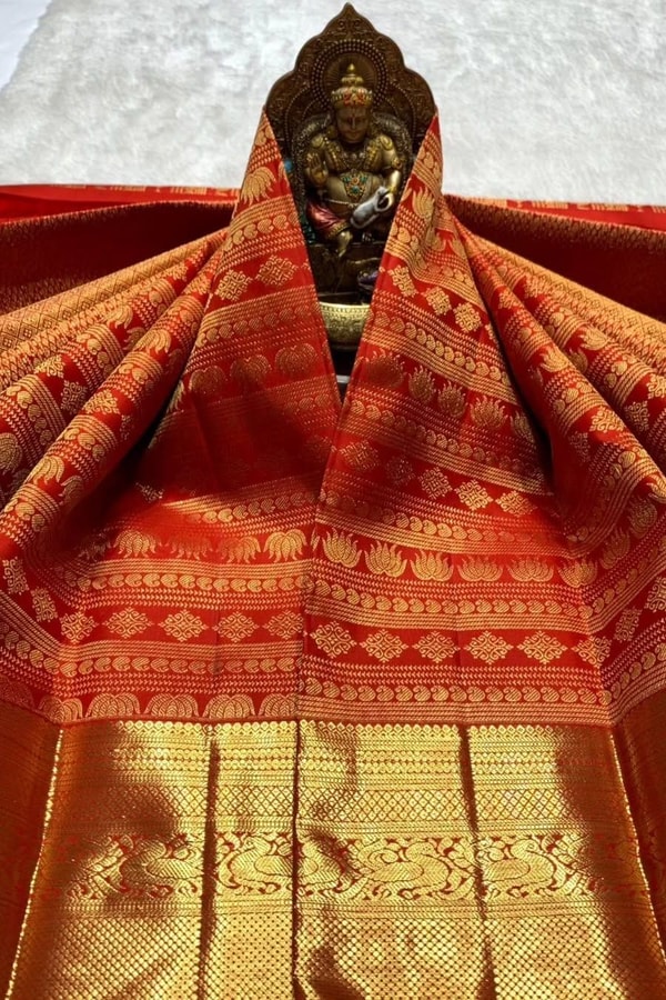 Horizontal Zari Band Banarasi Soft Silk Saree with Lotus and Mango Motifs in Red and Wine  in Surat