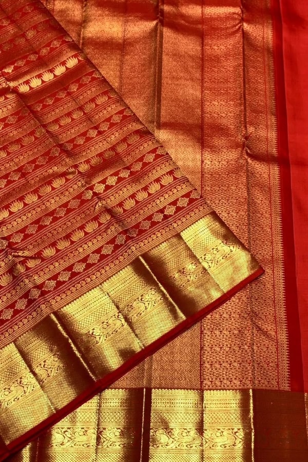 Horizontal Zari Band Banarasi Soft Silk Saree with Lotus and Mango Motifs in Red and Wine  in Surat