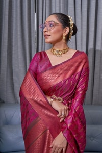 Ikat-Inspired Banarasi Soft Silk Saree with Copper Zari Weaving and Tasselled Pallu  in Surat