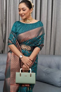 Ikat-Inspired Banarasi Soft Silk Saree with Copper Zari Weaving and Tasselled Pallu  in Surat