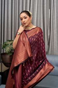 Ikat-Inspired Banarasi Soft Silk Saree with Copper Zari Weaving and Tasselled Pallu  in Surat
