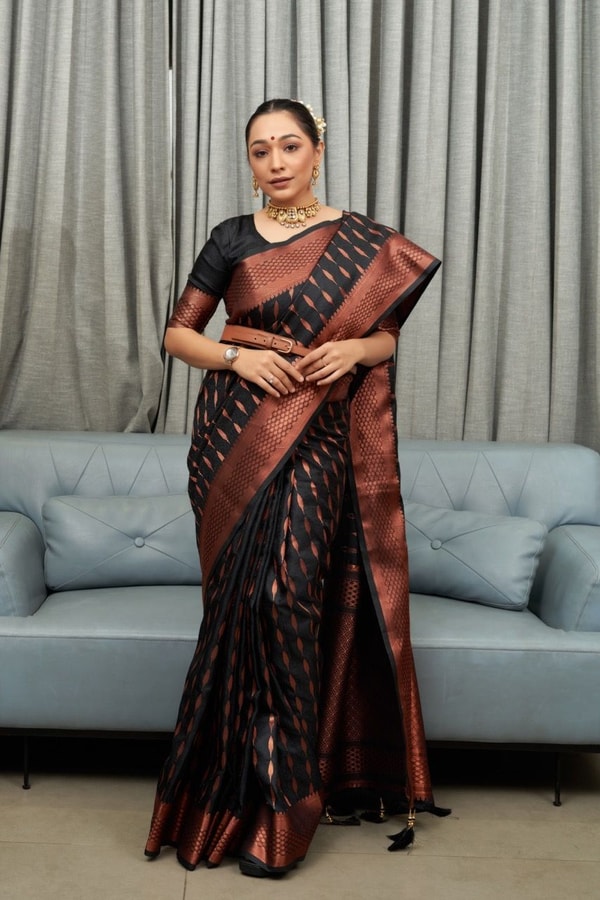 Ikat-Inspired Banarasi Soft Silk Saree with Copper Zari Weaving and Tasselled Pallu  in Surat