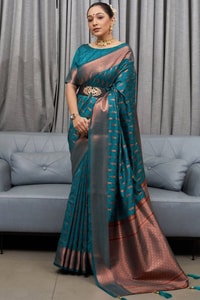 Ikat-Inspired Banarasi Soft Silk Saree with Copper Zari Weaving and Tasselled Pallu  in Surat