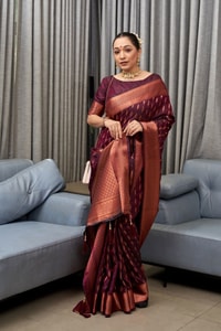 Ikat-Inspired Banarasi Soft Silk Saree with Copper Zari Weaving and Tasselled Pallu  in Surat