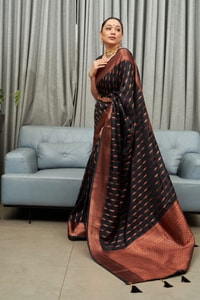Ikat-Inspired Banarasi Soft Silk Saree with Copper Zari Weaving and Tasselled Pallu  in Surat