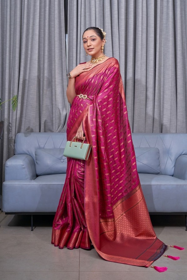 Ikat-Inspired Banarasi Soft Silk Saree with Copper Zari Weaving and Tasselled Pallu  in Surat