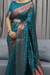 Ikat-Inspired Banarasi Soft Silk Saree with Copper Zari Weaving and Tasselled Pallu  in Surat