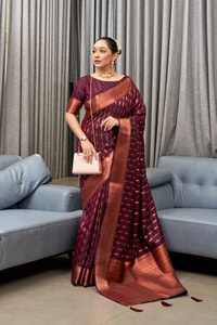 Ikat-Inspired Banarasi Soft Silk Saree with Copper Zari Weaving and Tasselled Pallu  in Surat