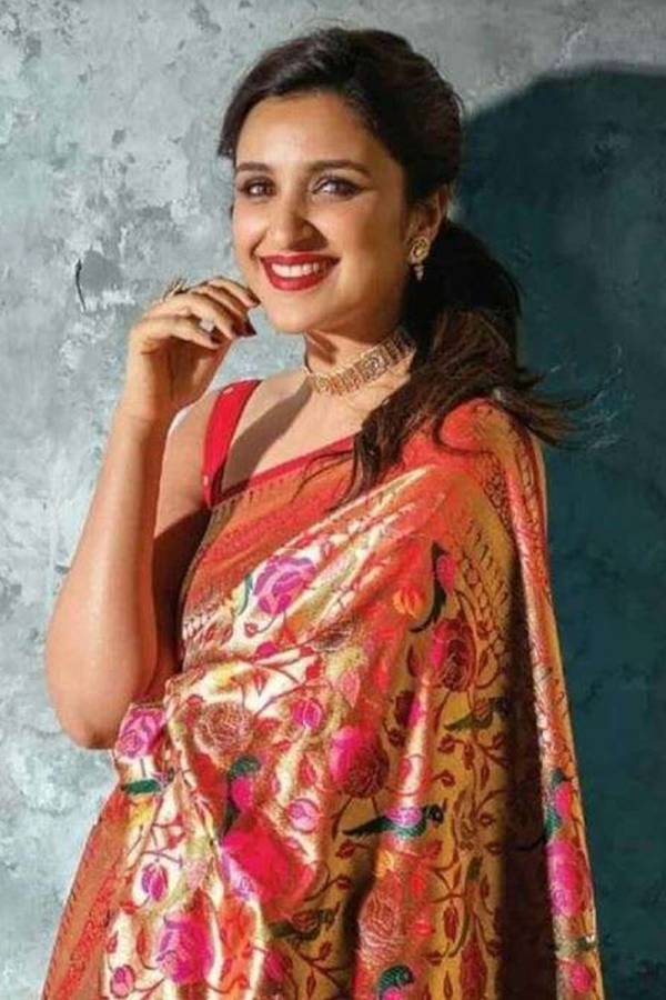 Intricately Woven Banarasi Silk Saree with Floral Motifs and Zari Embellishments  in Surat