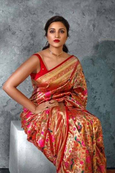 Intricately Woven Banarasi Silk Saree with Floral Motifs and Zari Embellishments in Surat