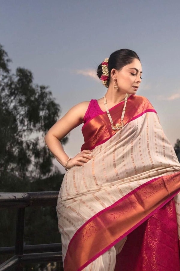 Ivory Pinstripe Banarasi Soft Silk Saree with Contrast Rani Pink Border and Copper Zari  in Surat