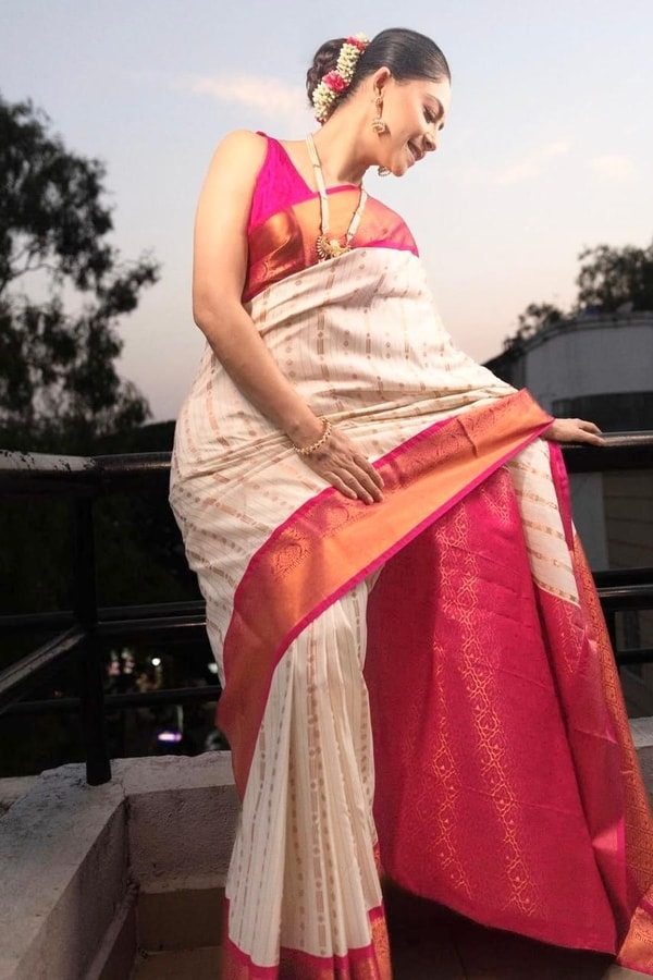 Ivory Pinstripe Banarasi Soft Silk Saree with Contrast Rani Pink Border and Copper Zari  in Surat