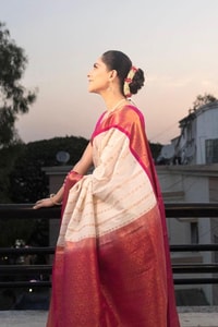 Ivory Pinstripe Banarasi Soft Silk Saree with Contrast Rani Pink Border and Copper Zari  in Surat