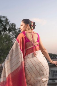 Ivory Pinstripe Banarasi Soft Silk Saree with Contrast Rani Pink Border and Copper Zari  in Surat
