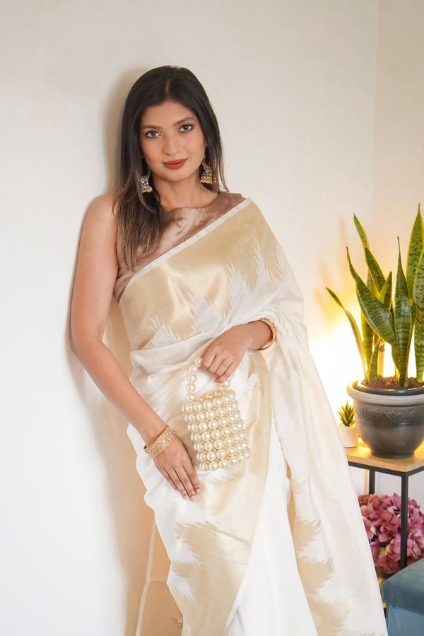 Ivory White Banarasi Soft Silk Saree with Broad Gold Zari Border and Woven Gold Pallu  in Surat