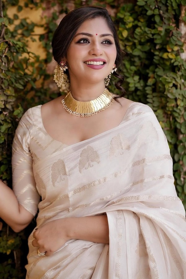 Ivory White Banarasi Soft Silk Saree with Gold Zari Leaf Buttas and Subtle Zari Border  in Surat