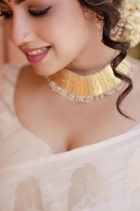 Ivory White Banarasi Soft Silk Saree with Gold Zari Leaf Buttas and Subtle Zari Border  in Surat