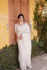 Ivory White Banarasi Soft Silk Saree with Gold Zari Leaf Buttas and Subtle Zari Border  in Surat