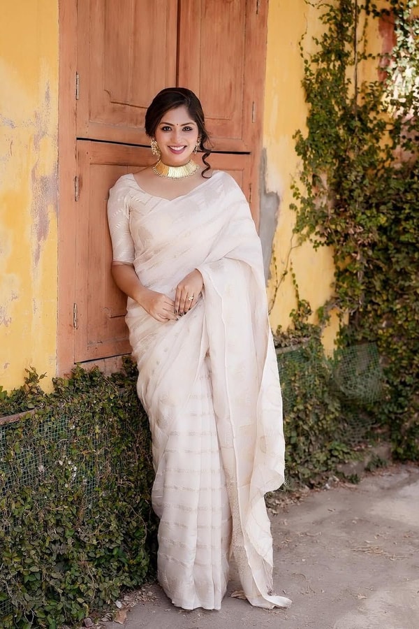 Ivory White Banarasi Soft Silk Saree with Gold Zari Leaf Buttas and Subtle Zari Border  in Surat