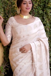 Ivory White Banarasi Soft Silk Saree with Gold Zari Leaf Buttas and Subtle Zari Border  in Surat video 2