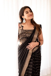 Jet Black Banarasi Soft Silk Saree with Spaced Silver Zari Lines and Shimmering Silver Border  in Surat