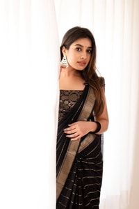 Jet Black Banarasi Soft Silk Saree with Spaced Silver Zari Lines and Shimmering Silver Border  in Surat