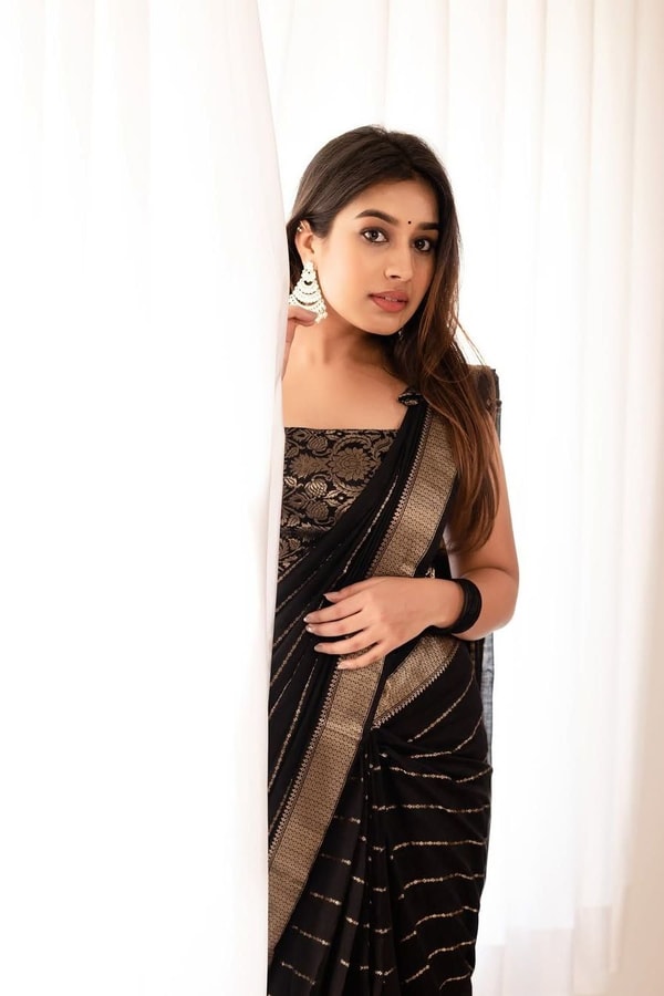 Jet Black Banarasi Soft Silk Saree with Spaced Silver Zari Lines and Shimmering Silver Border  in Surat