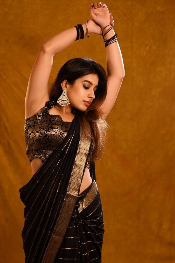 Jet Black Banarasi Soft Silk Saree with Spaced Silver Zari Lines and Shimmering Silver Border  in Surat