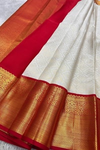 Kanjivaram-Style Cream Banarasi Soft Silk Saree with Wide Gold Zari Border in Green or Red  in Surat