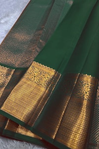 Kanjivaram-Style Cream Banarasi Soft Silk Saree with Wide Gold Zari Border in Green or Red  in Surat