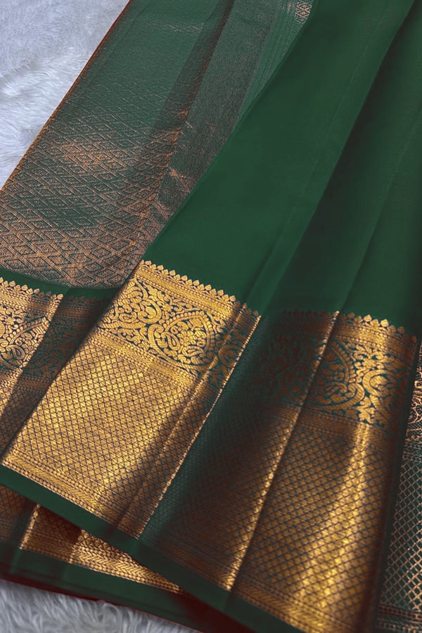 Kanjivaram-Style Cream Banarasi Soft Silk Saree with Wide Gold Zari Border in Green or Red  in Surat