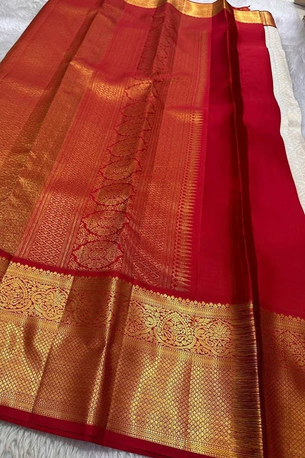 Kanjivaram-Style Cream Banarasi Soft Silk Saree with Wide Gold Zari Border in Green or Red  in Surat