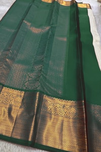 Kanjivaram-Style Cream Banarasi Soft Silk Saree with Wide Gold Zari Border in Green or Red  in Surat