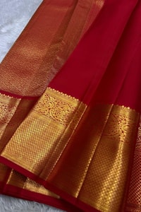 Kanjivaram-Style Cream Banarasi Soft Silk Saree with Wide Gold Zari Border in Green or Red  in Surat