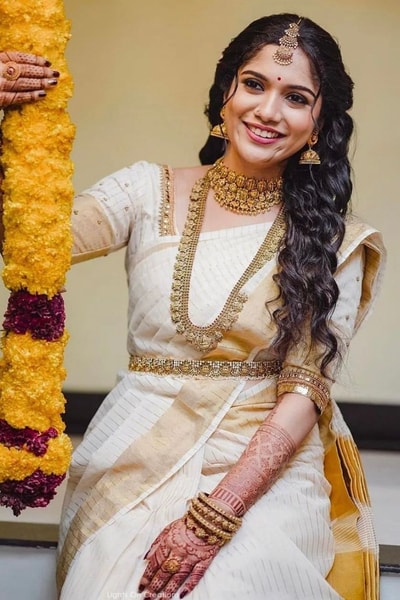 Kerala Kasavu-Style Cream Banarasi Soft Silk Saree with Gold Zari Border and Striped Pallu in Surat