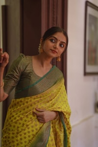 Lemon Yellow Banarasi Soft Silk Saree with Polka Buttis and Contrast Dark Brocade Border  in Surat